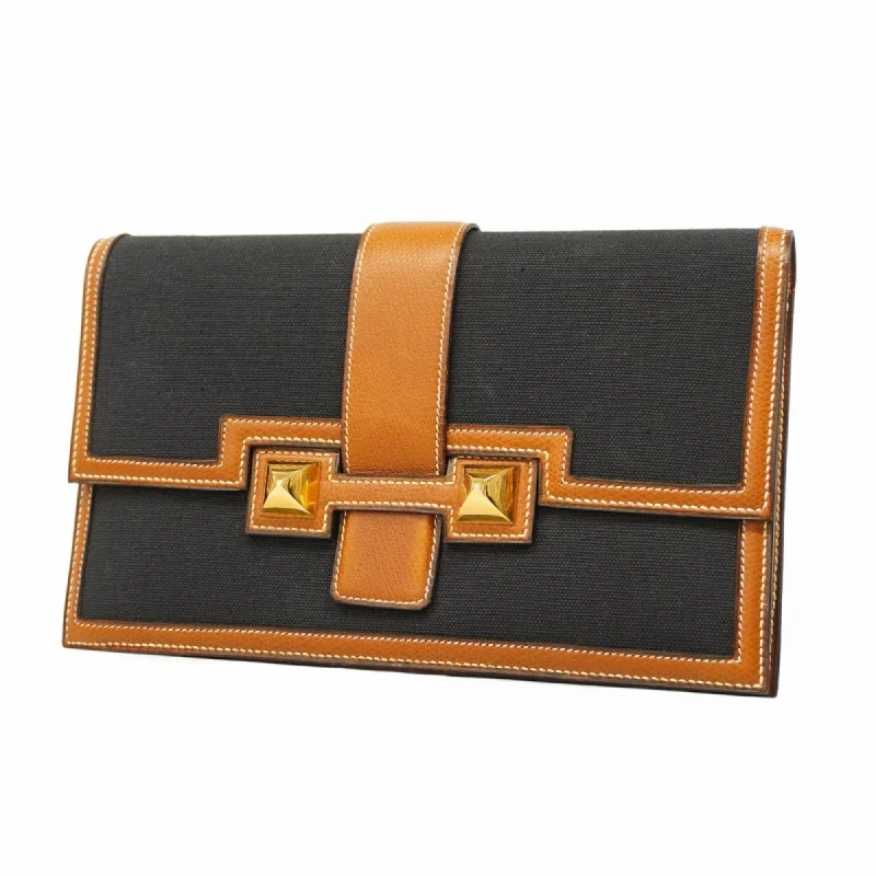 Handle bags with tropical prints for summer -Hermes   Canvas Leather Clutch Bag (Pre-Owned)