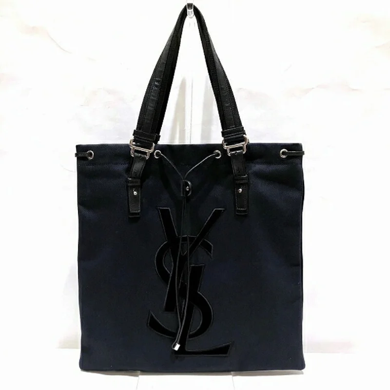 Handle bags with vintage vibes for nostalgia -Yves Saint Laurent Kahala  Canvas Leather Tote Bag (Pre-Owned)