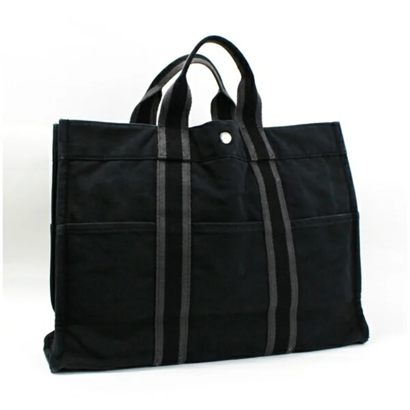 Handle bags with soft linings for protection -Hermes  Canvas Tote Bag (Pre-Owned)