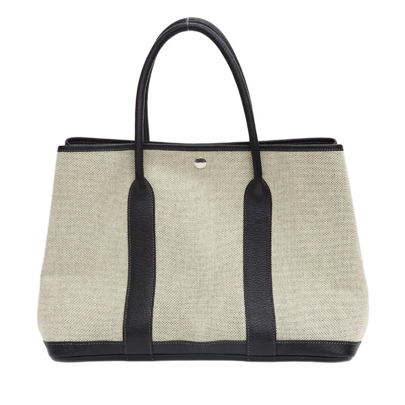 Handle bags with woven fabric for texture -Hermes Garden  Toile H Leather Tote Bag (Pre-Owned)