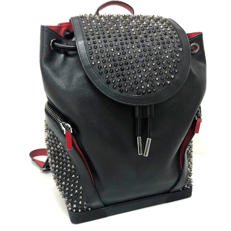 Handle bags with vibrant colors for boldness -Christian Louboutin  Leather Backpack (Pre-Owned)