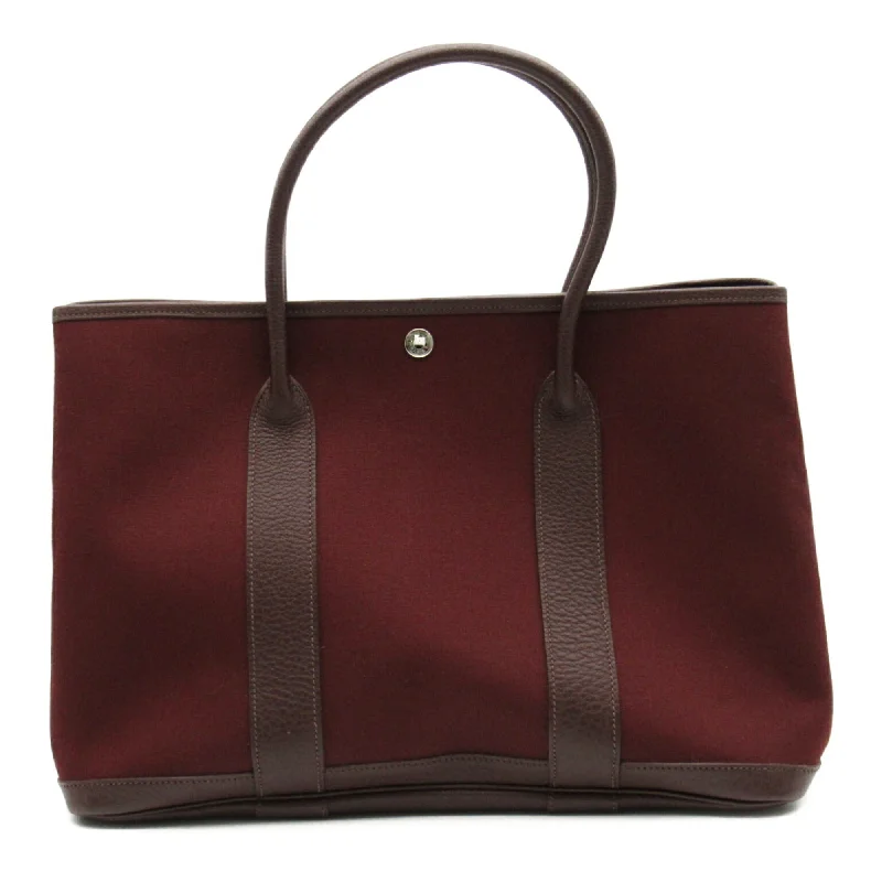 Handle bags with spacious interiors for storage -Hermes Garden   Color Fabric Leather Tote Bag (Pre-Owned)