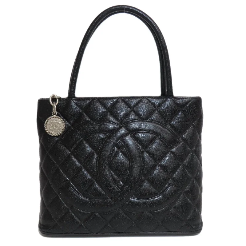 Handle bags with bold stripes for trendiness -Chanel  Caviar Leather Tote Bag (Pre-Owned)