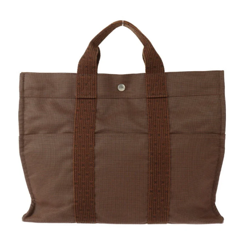 Handle bags with sleek hardware for sophistication -Hermes  Canvas Handbag Tote Bag (Pre-Owned)