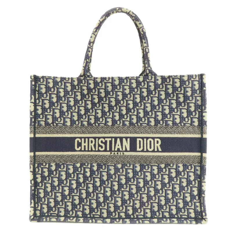 Handle bags with sleek black for elegance -Christian Dior  Canvas Tote Bag (Pre-Owned)