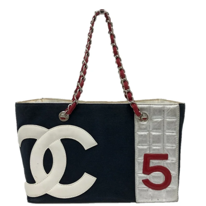 Small handle bags perfect for quick trips -Chanel  Cloth Tote Bag (Pre-Owned)