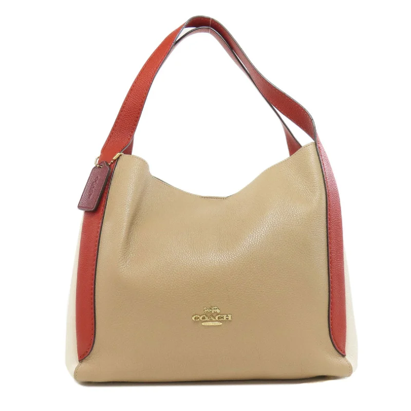 Handle bags with elegant gold-tone hardware -Coach   Color  Leather Tote Bag (Pre-Owned)