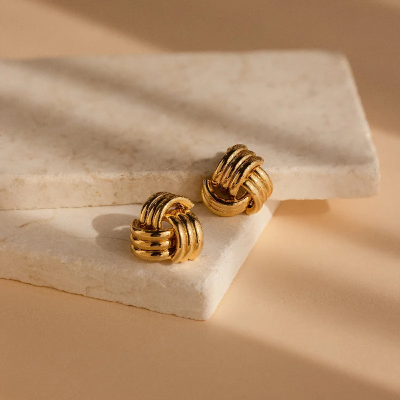 Best hoop earrings with baroque pearls for a luxurious and elegant vibe-Bold Triple Knot Studs