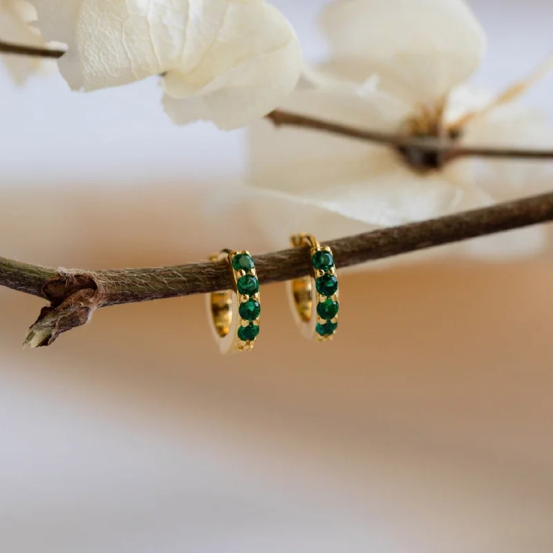 Hoop earrings with oversized designs for a bold, fashion-forward statement-Elise Emerald Huggies