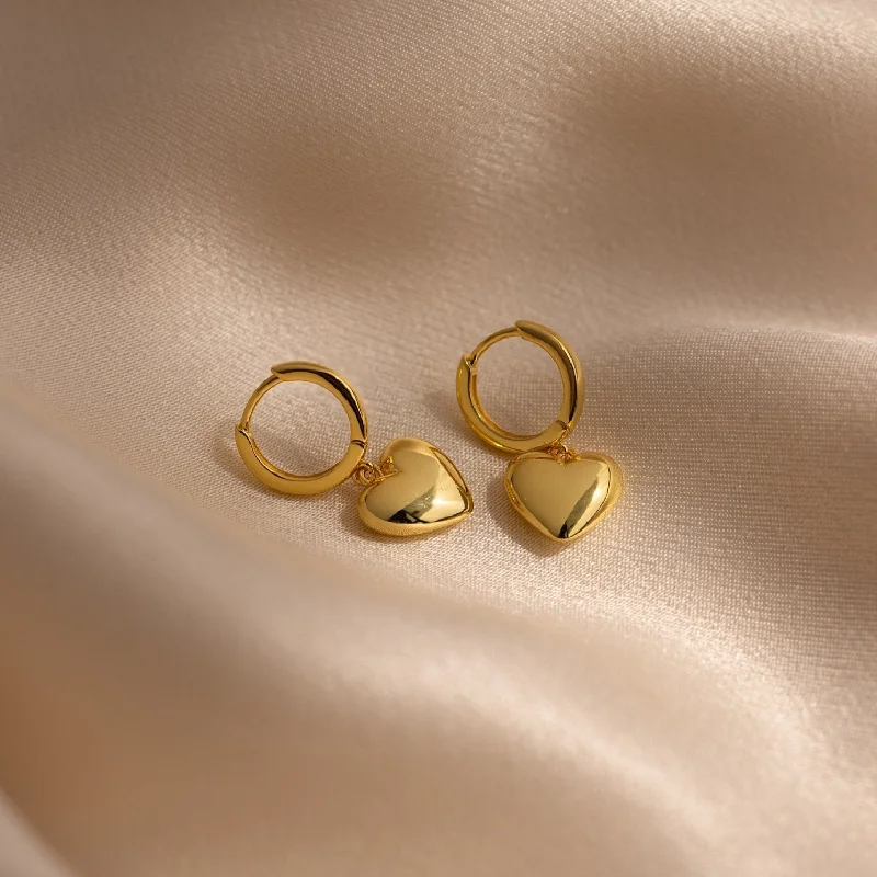 Hoop earrings with leather accents for a sleek and bold combination-Puff Heart Charm Huggies