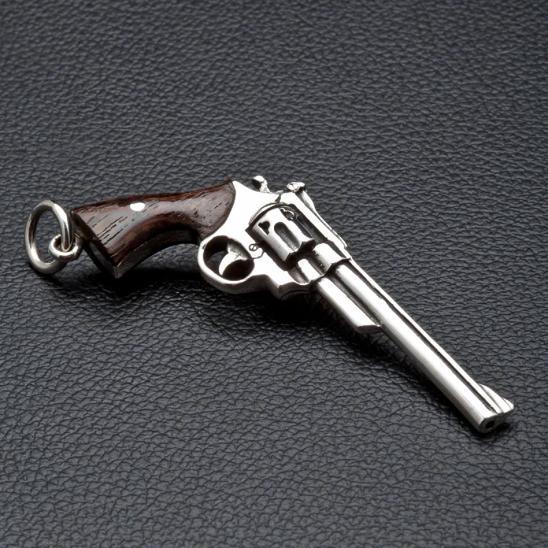 Layered necklaces and pendants for a trendy and fashionable stacked look-Cowboy Gun Revolver Sterling Silver Wood Pendant