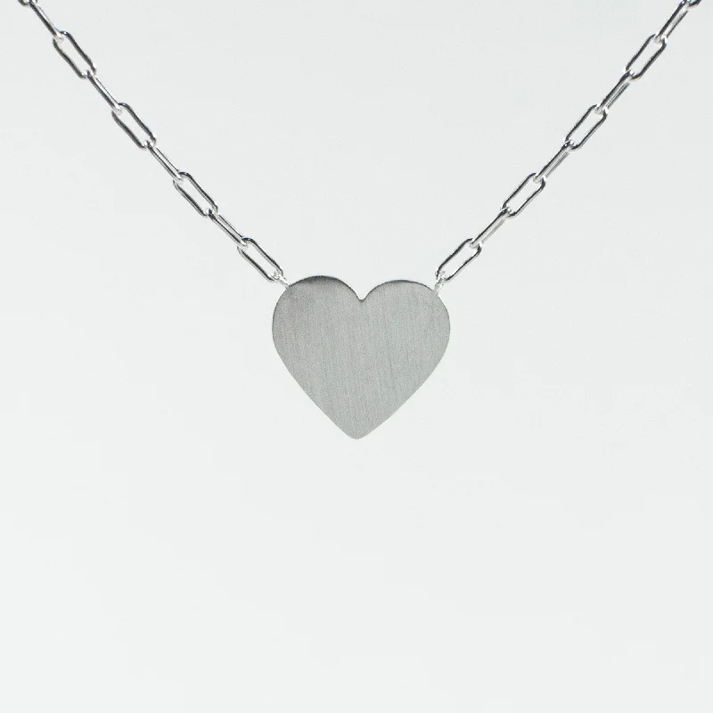 Unique necklaces and pendants with tree of life motifs for nature-inspired elegance-Brushed Silver Cutout Heart Necklace