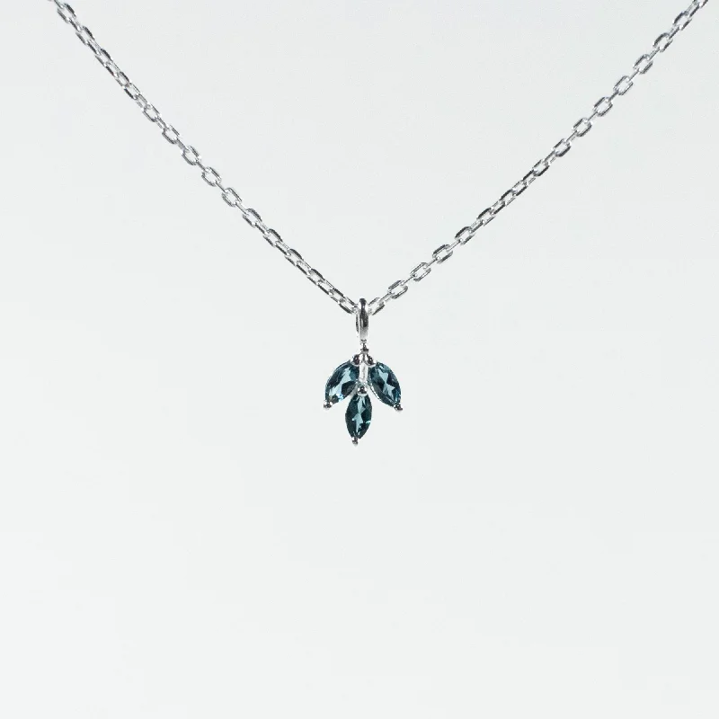 Necklaces and pendants with leaf-shaped designs for an earthy, organic feel-Silver Blue Topaz Leaf Necklace