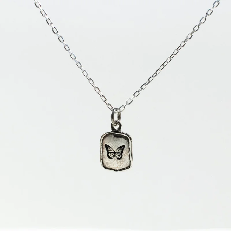 Best necklaces and pendants with statement designs for a fashionable accessory-Small Silver Butterfly Necklace